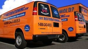 Water Damage Restoration Vans Lined Up Ready For Work