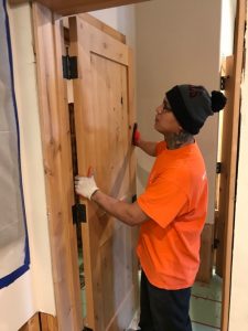 A Technician Making Structural Repairs During the Water Restoration